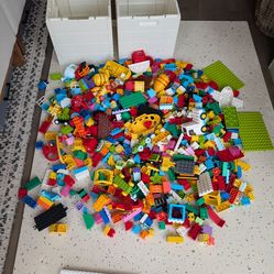 2 full storage boxes of Lego duplos (storage boxes included)