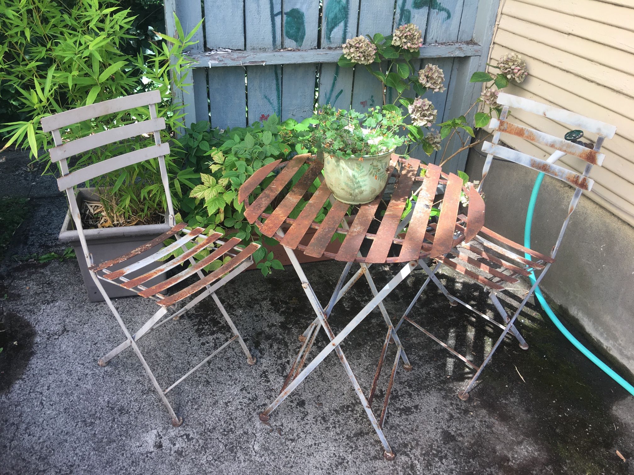 VINTAGE RUSTIC GARDEN PATIO SET - IRON TABLE AND TWO CHAIRS