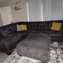 Grey sectional & ottoman 