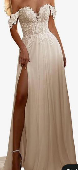 Elegant off-shoulder lace gown with slit