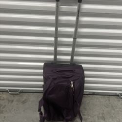 HEAD Travel Wheel Duffle Overnight Bag Carryon Luggage 2 Side Pocket. Purple! Used in good condition with some minor cosmetic blemishes. These blemish