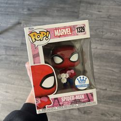 Spider-Man Holding Flowers