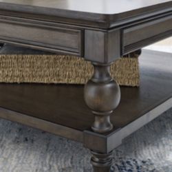  Coffee Table And 3 End Tables By Ashley Furniture