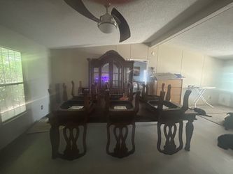 Table and china cabinet