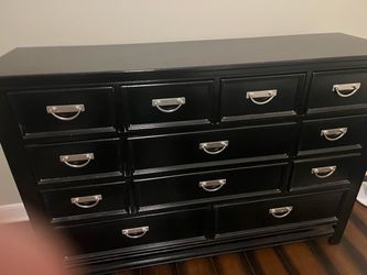 Black dresser with matching mirror