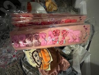 Bag of new items jewelers hair accessories perfume socks