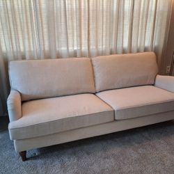 beige linen-like sofa