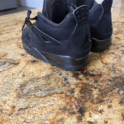 Air Jordan 4s Black Cats