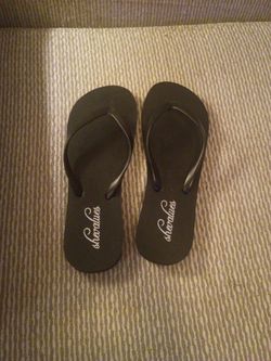 Brand new black flip flop