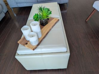 Coffee table with trays, storage and extra seating