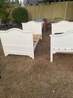 Nice 2 white twin bed frame ( $59 for each or 100 for two