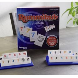 Rummikub is one of the world's best-selling and most-played games Players take turns placing numbered tiles in runs or groups, Rummy style - the first