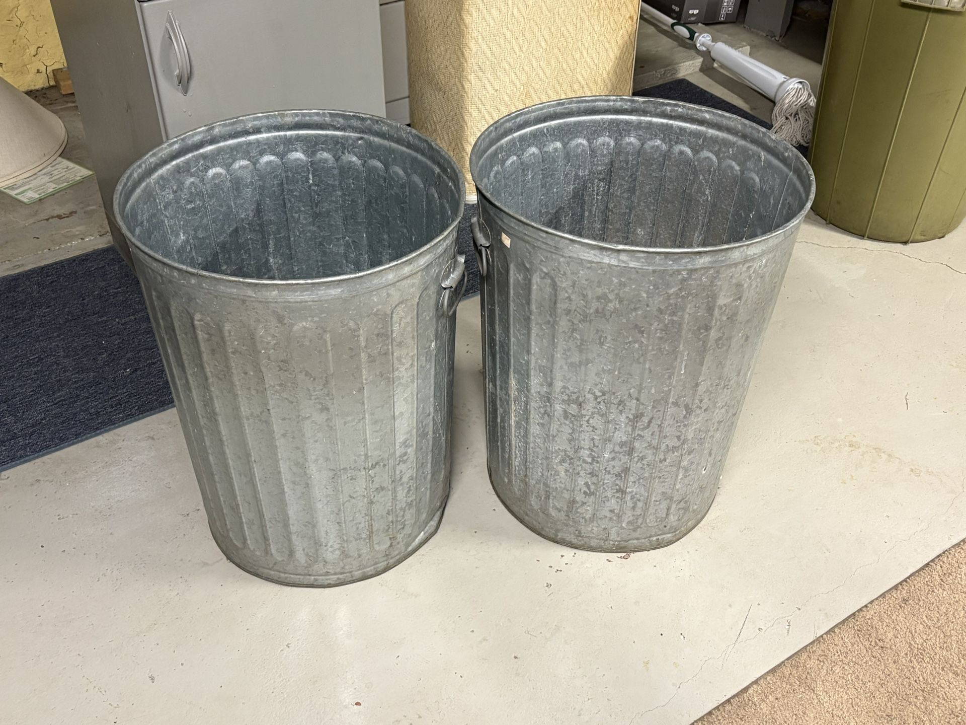 Two Aluminum Trash Cans