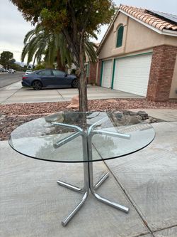 1970s Italian chrome & glass tubular round dining table