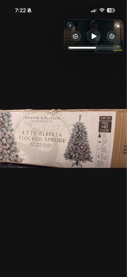 Donner & Blitzen 4.5 ft Flocked Spruce Christmas Tree