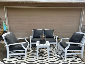 Outdoor wooden furniture with fire pit