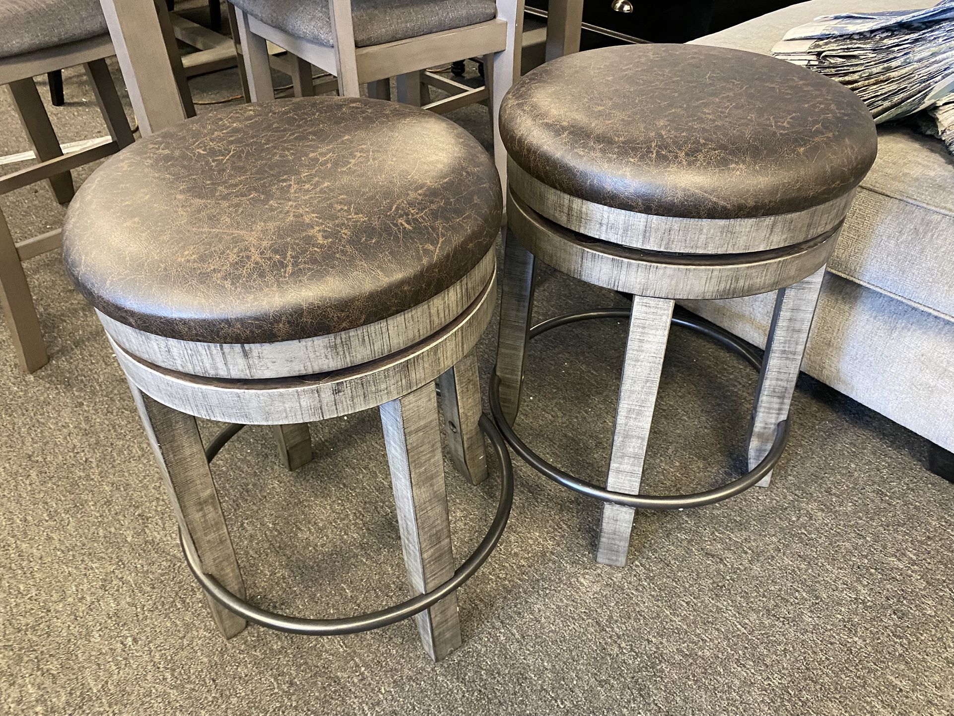 Backless  Swivel Bar Stool Available $125 Each