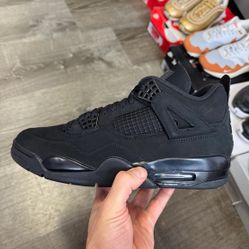 Black Cat Jordan 4s