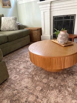 Round wood coffee table