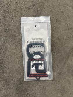 Veto Bag Keychain Bottle Opener