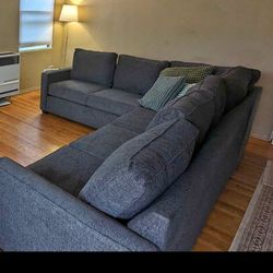 Beautiful And Clean Dark Blue Sectional Couch From Ashley Furniture 