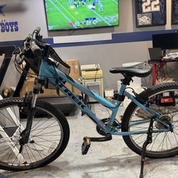  Trek 24” kids mountain bike. Aluminum frame, front suspension, Shimano components, Bontrager tires. Good condition, normal wear. Great bike for ages 