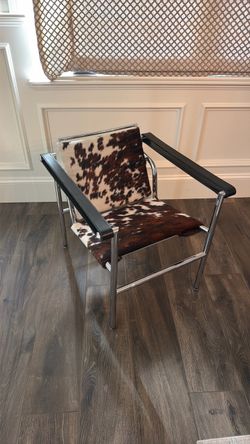 Vintage cow hide mid century modern chair