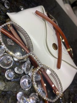 Millionaire Celebrity Glasses “Look Like Money” One (1) Unisex wooden frame with sparkling lab, diamond ice trim. Comes with a white protective case f