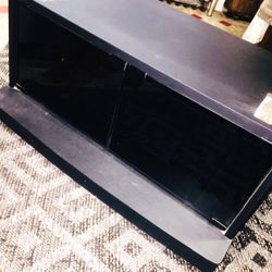 TELEVISION STAND in BLACK FORMICA GLASS BOTTOM DOORS CASTERS 29 X 17x 14