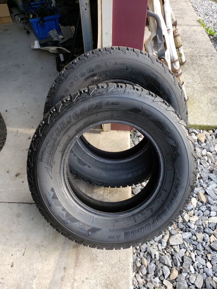 Set of 2 Firestone Winterforce winter tires 70% tread P235/70R16 P235-70-R16