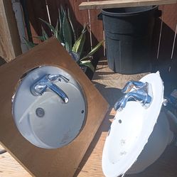 2 bathroom sinks with facets
