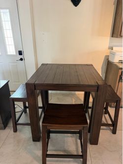 Pub style table with 4 chairs
