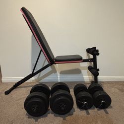 Home gym set with dumbbells and adjustable bench.
