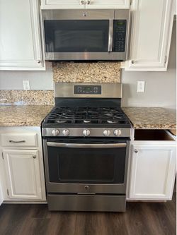 GE 30 inch gas stove/oven and matching microwave