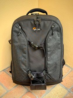 Two Lowepro camera bags - Pro Runner backpack and Urban Reporter messenger bag