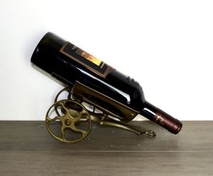 Vintage brass bottle holder on wheels...brass wine holder with wheels...rolling brass wine stand.

