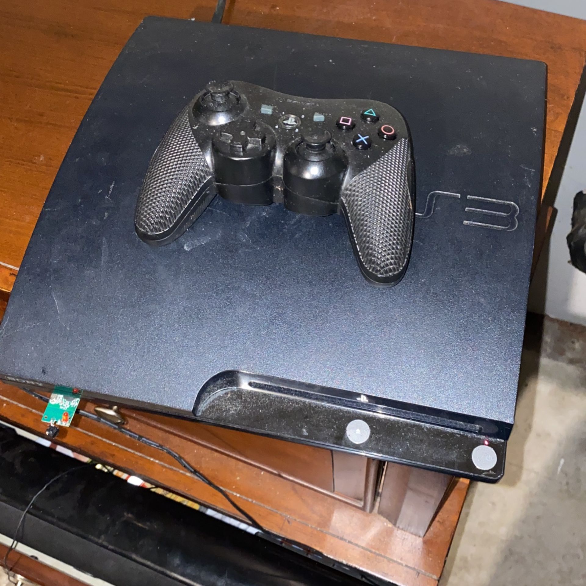 PS3 With Remote And Games