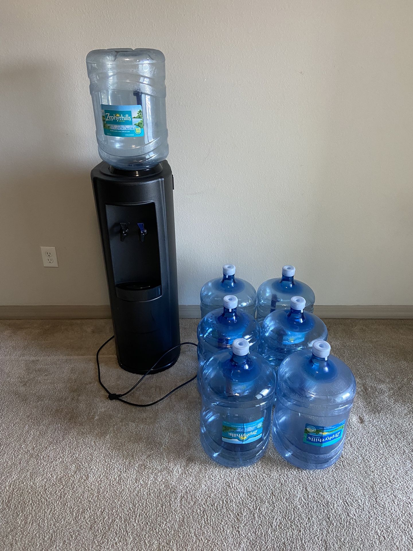 Water Dispenser And Water Jugs