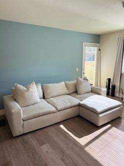 Living Spaces Sofa Couch with Reversible Chaise