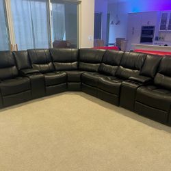 BLACK LEATHER RECLINING SECTIONAL ONLY$1499