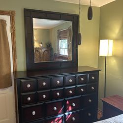 Large Dresser with 8 drawers and mirror.  Beautiful cherry wood color!