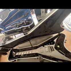 Jackson Flying V Electric Guitar with Hard shell Case And Guitar strap