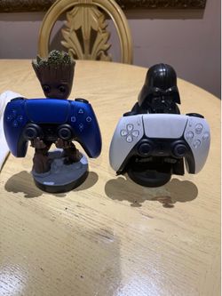 Ps5 controllers (2) with figures