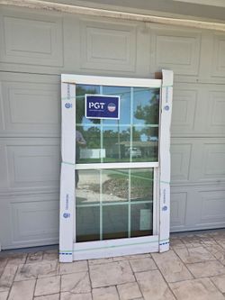Brand New 35.5W x 60.75H PGT WinGuard Vinyl Impact Window