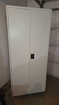 White metal locking cabinet with wheels