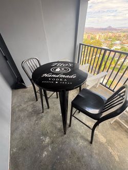 Round Black Metal Indoor-Outdoor Bar Table Set with 2 Vertical Slat Back Stools