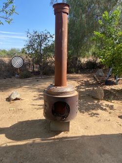 Rustic fire pit chimney