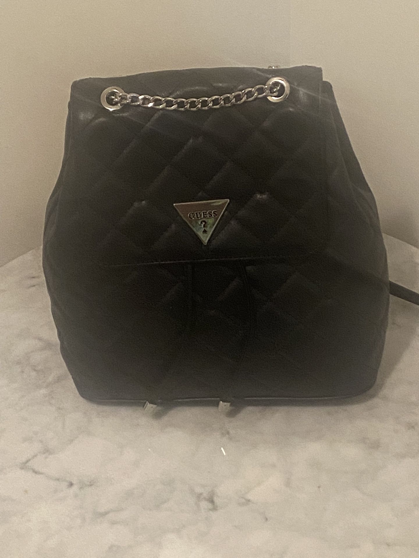 A Black Fancy Back Pack By Guess
