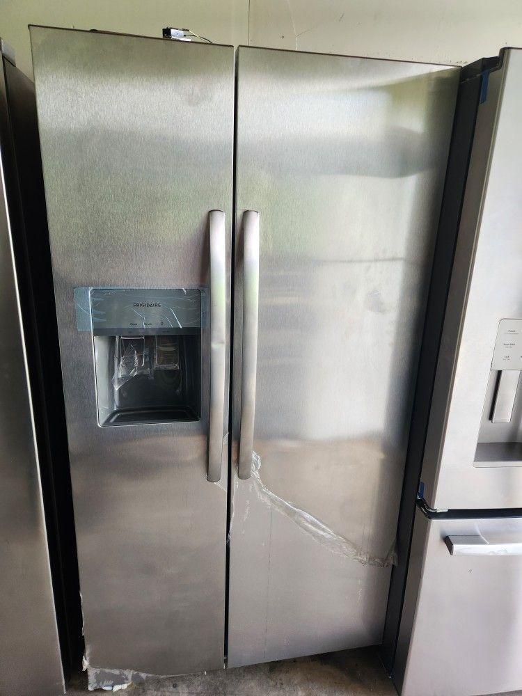 2-door refrigerator, 36 wide by 68 and a half high by 29 deep, FRIGIDAIRE brand, is new.