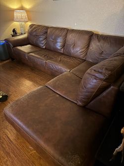 Brown Ashley’s furniture couch. 10” x 7” 250 OBO